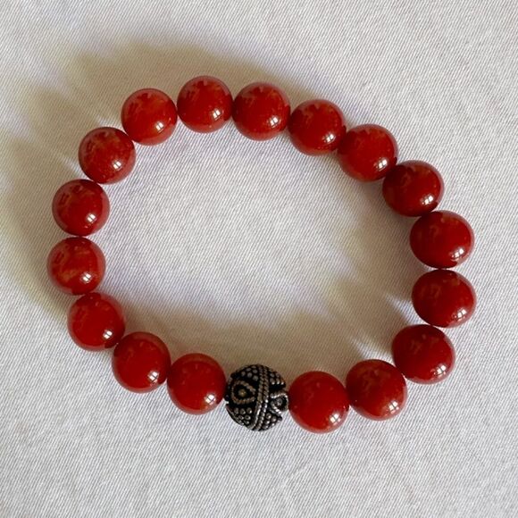 10mm rust jade stretch bracelet with 11mm Tibetan silver spacer. - Picture 3 of 4